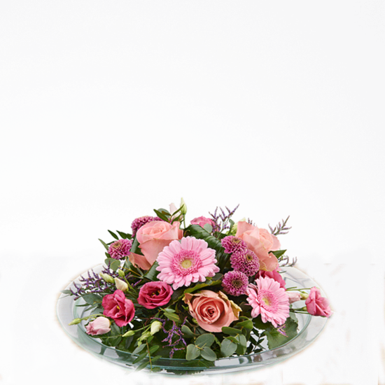 Bloemstuk in glazen schaal met roze bloemen (2 formaten)